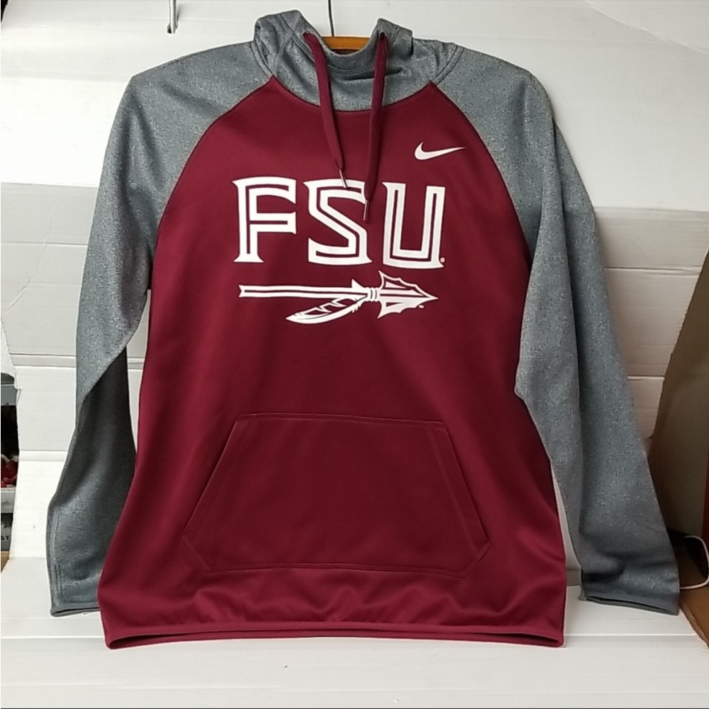 Womens nike sweatshirt, says medium but fits as a small!